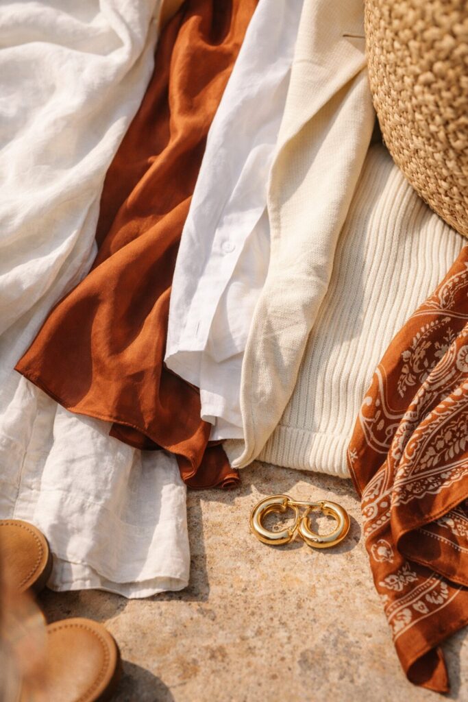 close-up of linen, silk, cotton and woven textures in a Spanish summer capsule wardrobe