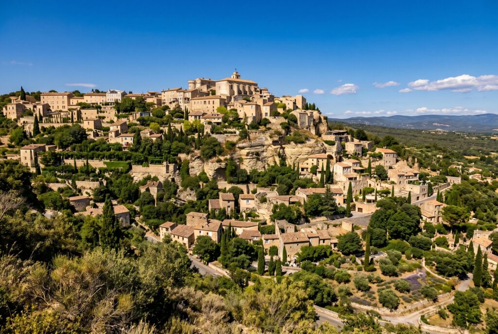 The Gorges du Verdon in Provence from a high canyon rim viewpoint with the extraordinary vivid turquoise-green Verdon river far below between pale grey and cream limestone canyon walls hundreds of metres deep and deep green pine forest on the upper edges
