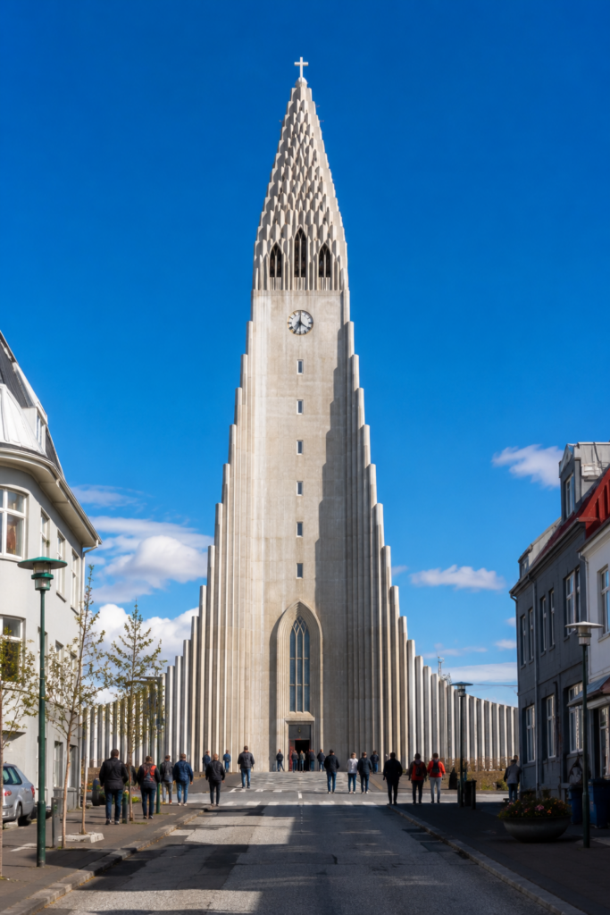 Hallgrímskirkja church tower rising over central Reykjavik in bright daylight